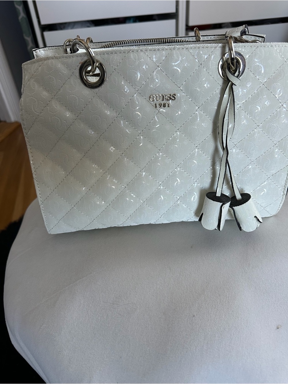 GUESS White Quilted Patent Tote with Tassel Charm